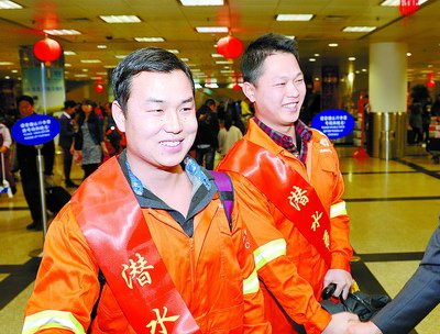 譚輝(左)和羅小明