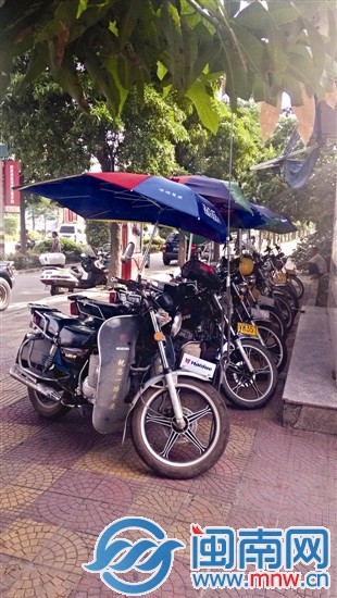 摩托車拆了遮陽(yáng)傘后方可放行