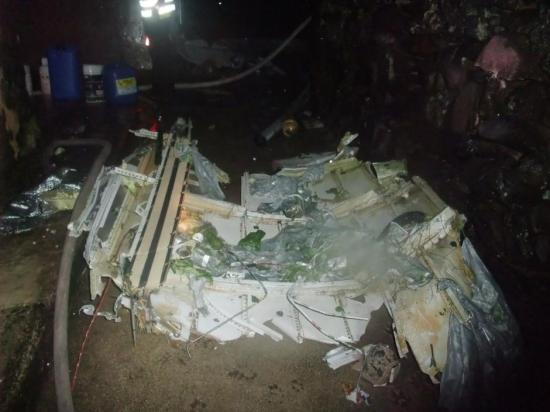 疑迫降失敗墜毀。圖為失事飛機殘骸。